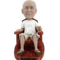 Bobblehead doll of on the Chair